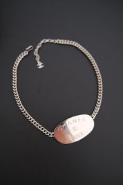 Vintage CHANEL 2000 silver-tone multi-chain choker necklace with oversized CHANEL centerpiece and iconic CC logo