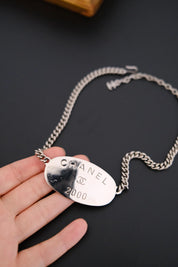 Vintage CHANEL 2000 silver-tone multi-chain choker necklace with oversized CHANEL centerpiece and iconic CC logo