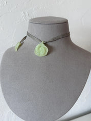 Vintage CHANEL translucent resin camellia flower pendant necklace worn as a long ribbon necklace