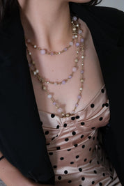 Vintage CHANEL lavender purple glass bead and pearl necklace styled with a dress
