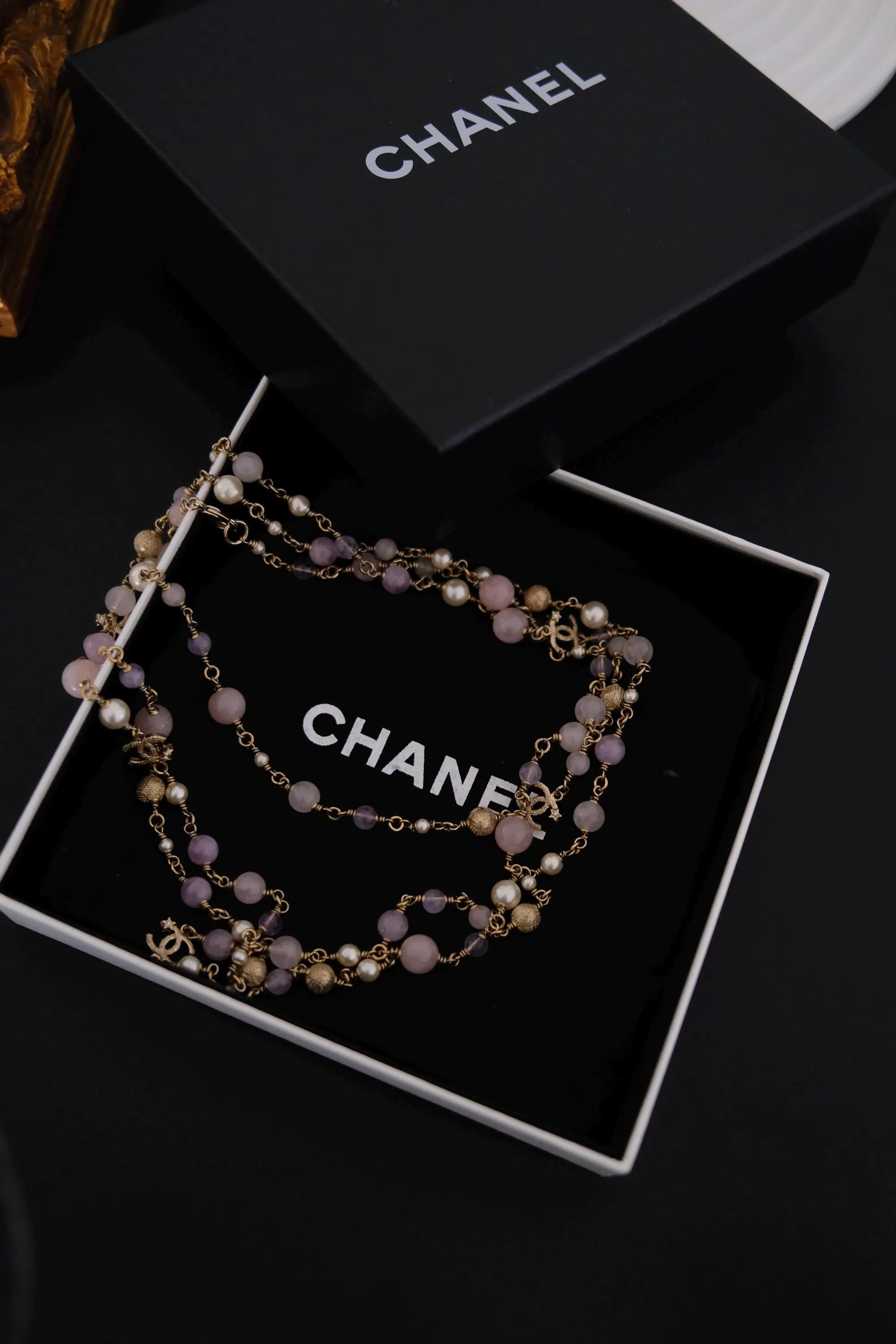 Vintage CHANEL lavender Gripoix glass and pearl sautoir necklace presented with CHANEL box