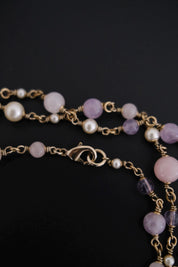 lobster clasp of vintage lavender Gripoix glass and pearl sautoir necklace
