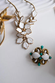 Vintage Christian Dior Germany gold tone brooch with white milk glass and turquoise cabochons