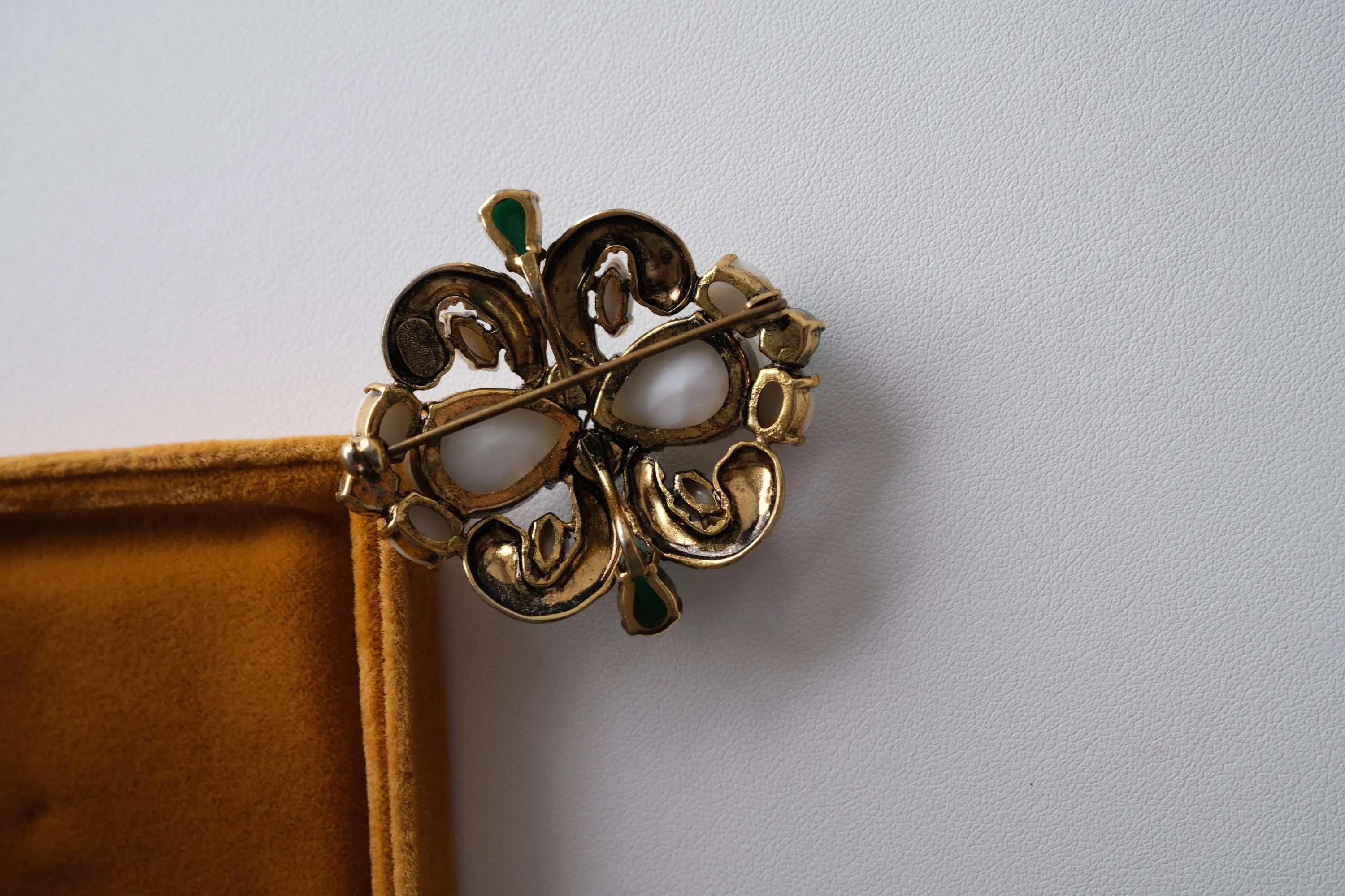 Back view of vintage Christian Dior Germany brooch with secure pin clasp