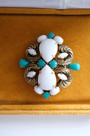 Vintage Christian Dior Germany gold tone brooch with white milk glass and turquoise cabochons