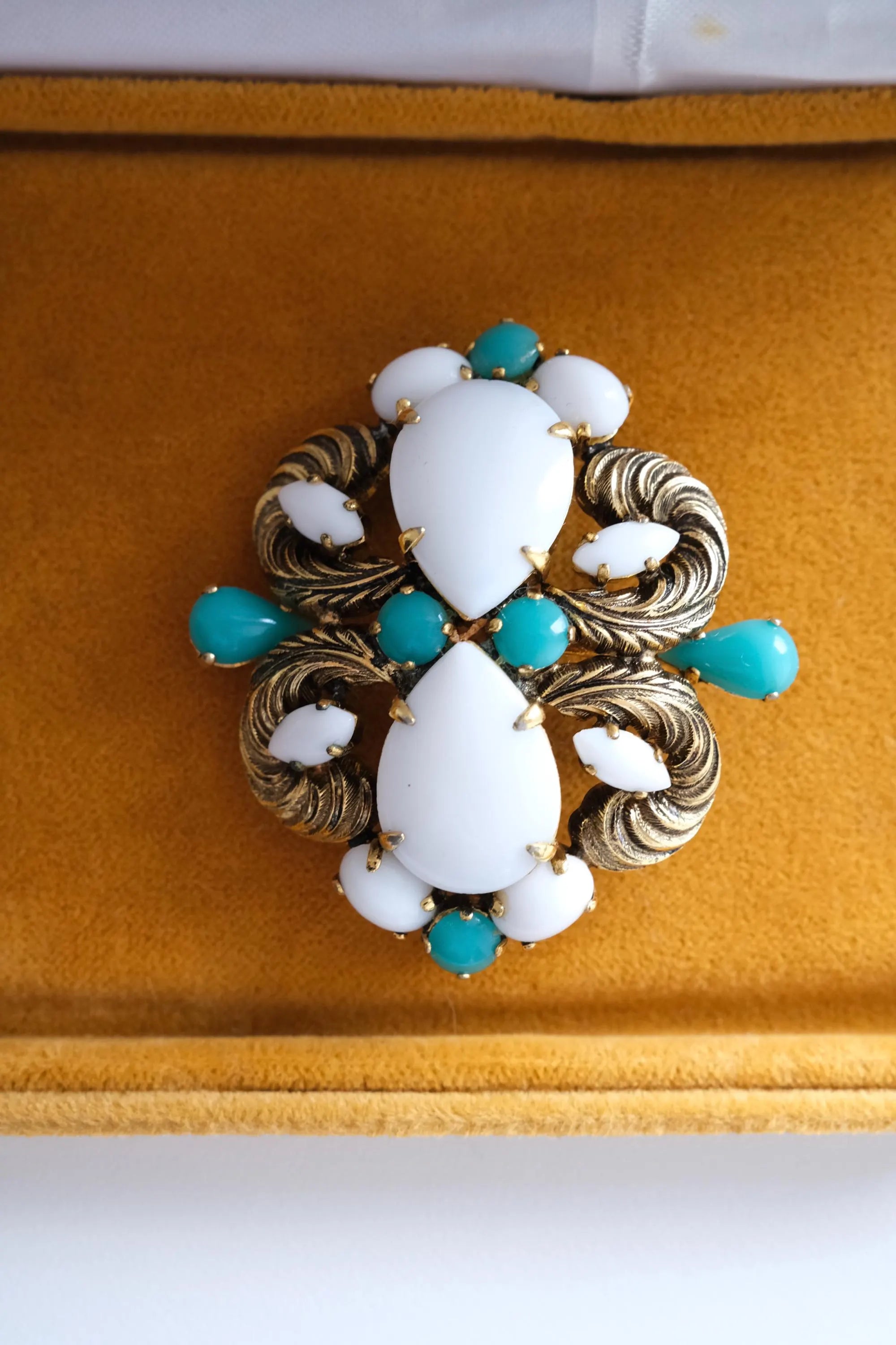 Vintage Christian Dior Germany gold tone brooch with white milk glass and turquoise cabochons