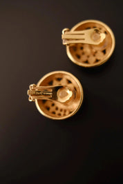 Reverse of vintage Christian Dior clip-on earrings showing Chr. Dior signature