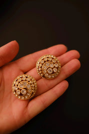 Vintage Christian Dior round crystal swirl clip-on earrings measuring approximately 3 cm in diameter