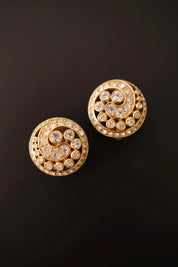 Excellent vintage condition Christian Dior gold-tone crystal swirl earrings with sparkling clear stones and sculptural spiral design