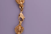 Vintage Christian Dior gold-tone necklace featuring 19 sculptural bee motifs, signed Dior Germany