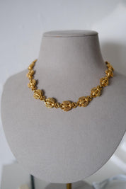 Vintage Christian Dior gold-tone necklace featuring 19 sculptural bee motifs, signed Dior Germany