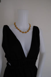Vintage Christian Dior gold-tone necklace featuring 19 sculptural bee motifs, signed Dior Germany