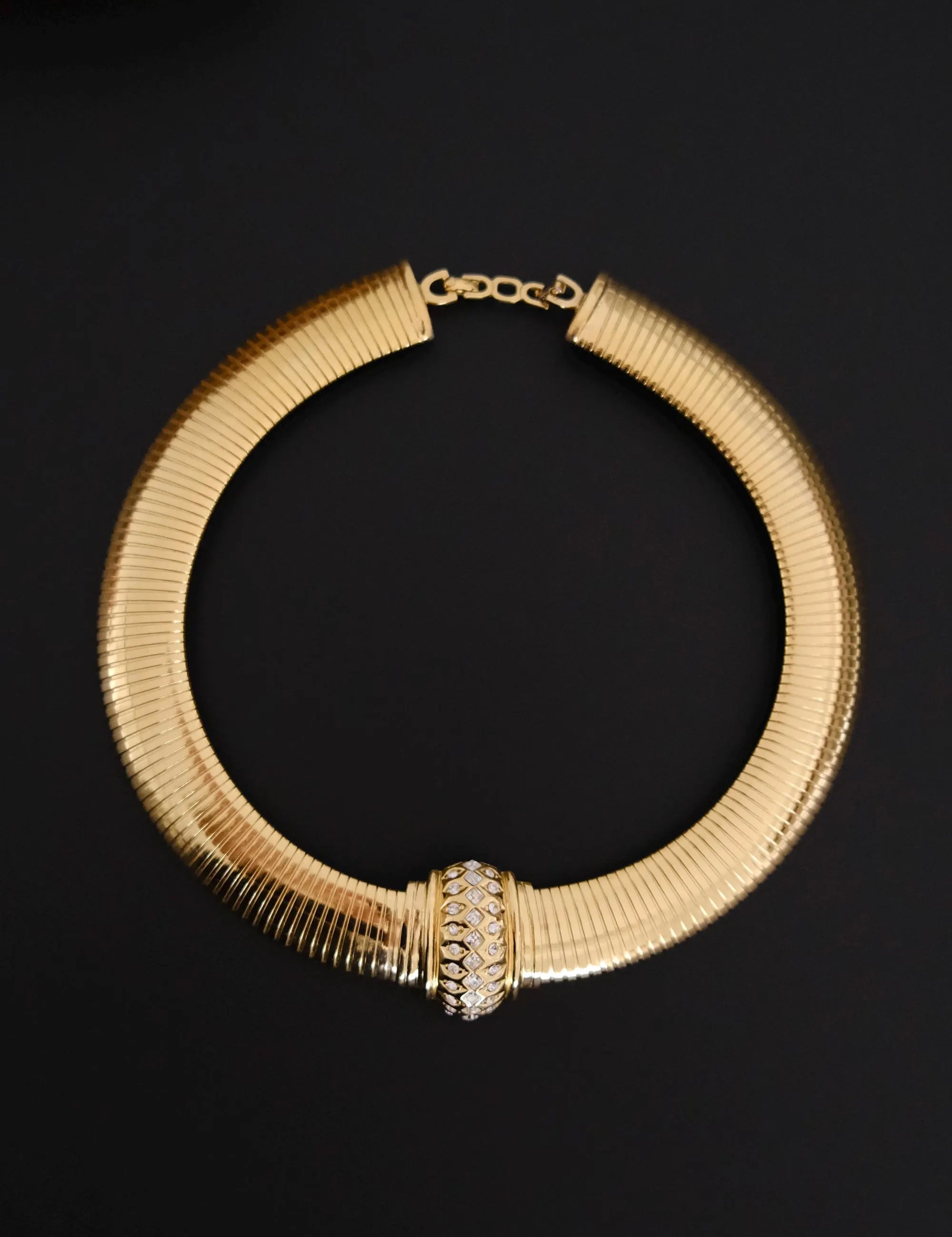 Vintage Christian Dior gold-tone Tubogas-style choker necklace with crystal centerpiece, signed Chr. Dior and made in Germany