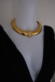 Vintage Christian Dior gold-tone Tubogas-style choker necklace with crystal centerpiece, signed Chr. Dior and made in Germany