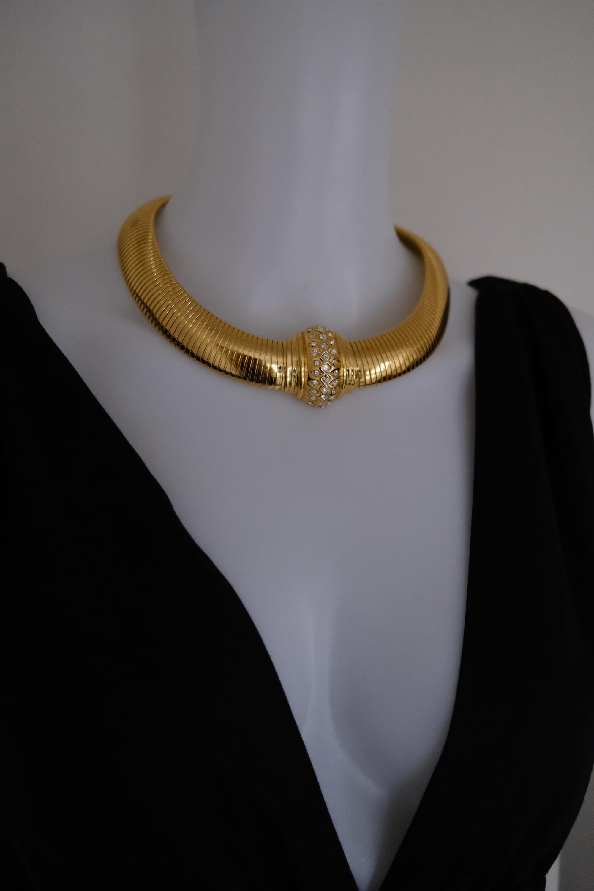 Vintage Christian Dior gold-tone Tubogas-style choker necklace with crystal centerpiece, signed Chr. Dior and made in Germany