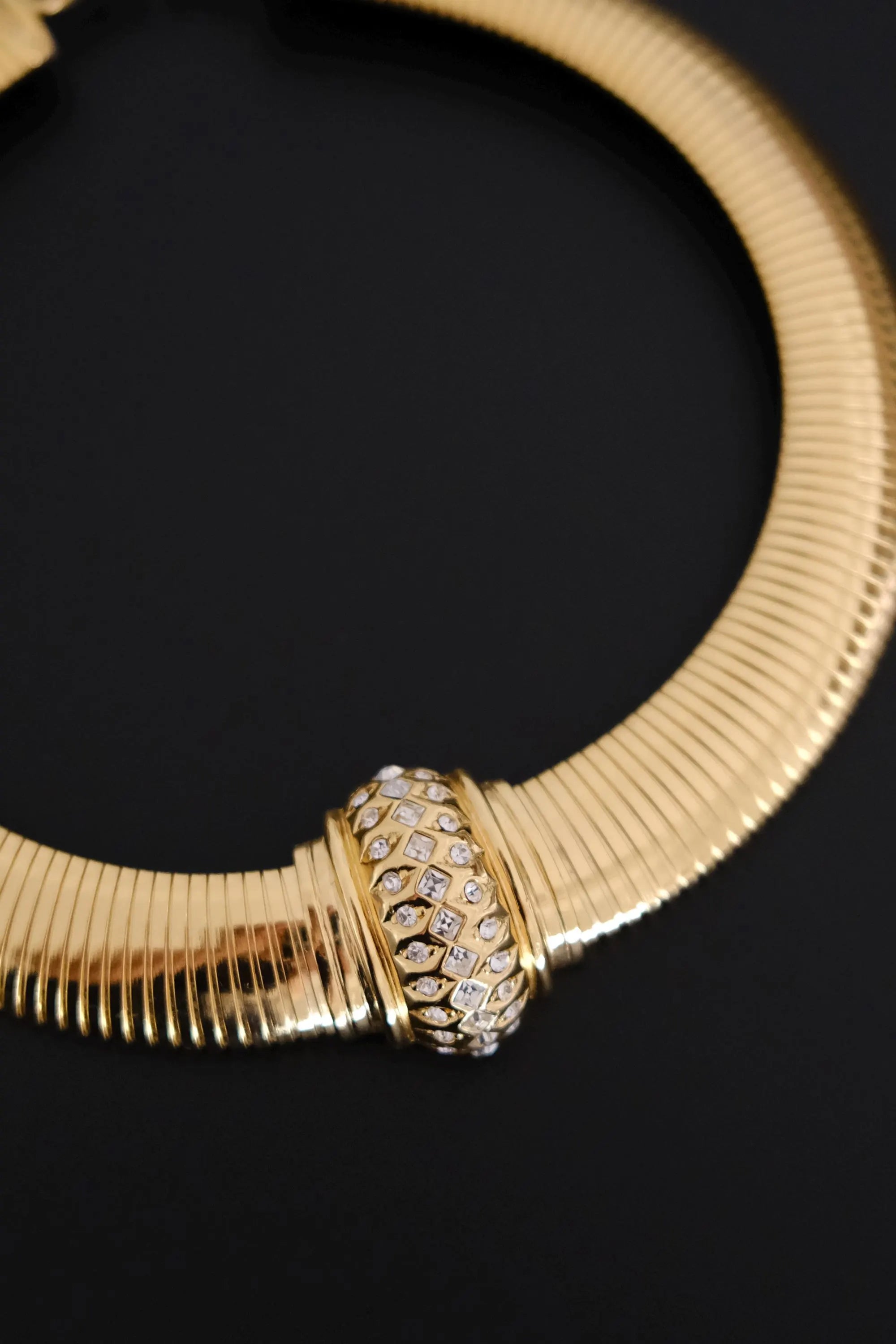 Vintage Christian Dior gold-tone Tubogas-style choker necklace with crystal centerpiece, signed Chr. Dior and made in Germany