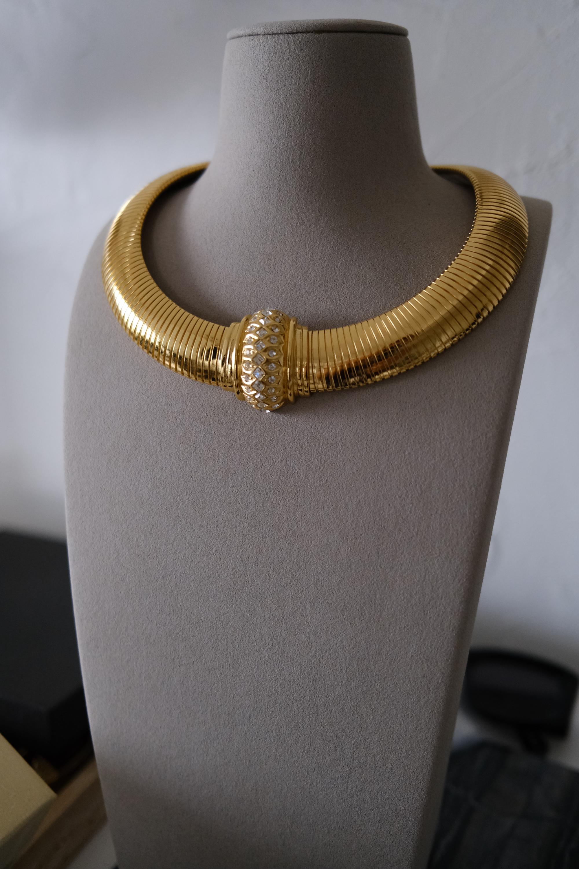 Vintage Christian Dior gold-tone Tubogas-style choker necklace with crystal centerpiece, signed Chr. Dior and made in Germany