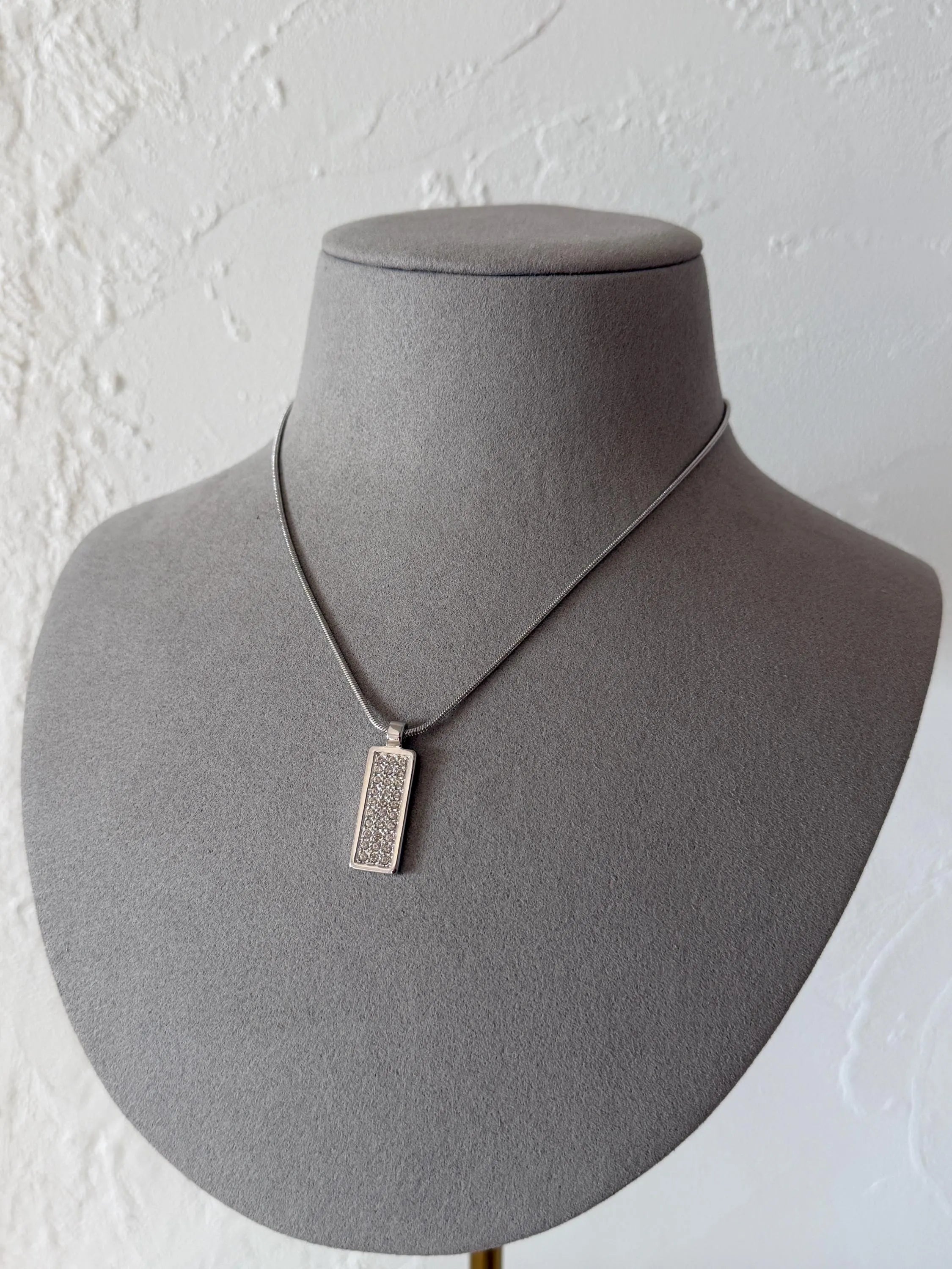 Excellent vintage condition Christian Dior silver-tone monogram and crystal pendant necklace