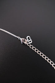 Christian Dior CD logo detail with lobster clasp and extension chain on vintage necklace
