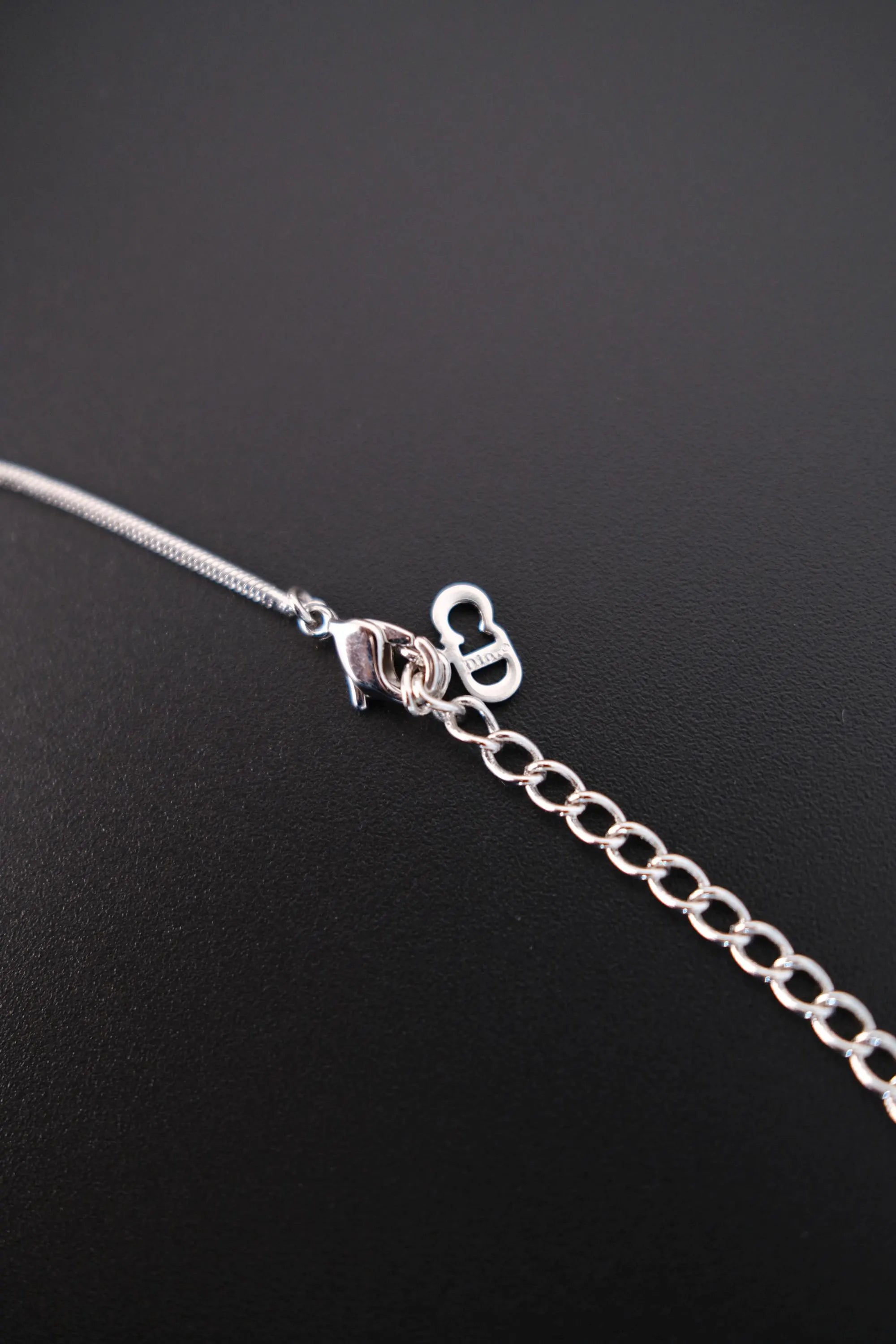 Christian Dior CD logo detail with lobster clasp and extension chain on vintage necklace