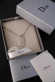 Vintage Christian Dior reversible pendant necklace presented with Dior branded box and packaging