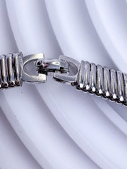 Vintage Christian Dior silver tone gaspipe design choker necklace with crystal charm