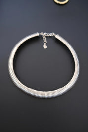 Vintage Christian Dior silver-tone Tubogas choker necklace with sculptural ribbed collar design, signed Germany