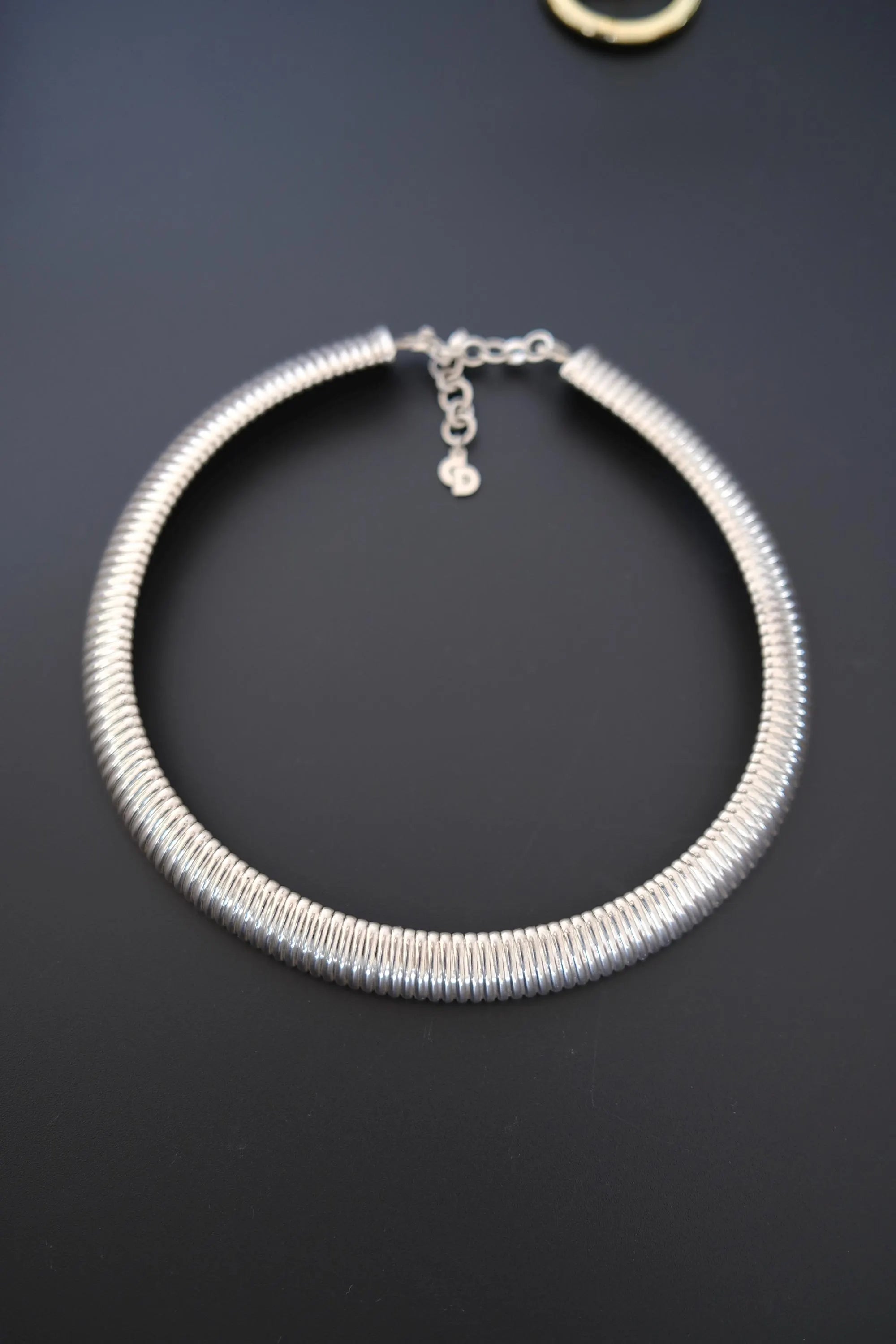 Vintage Christian Dior silver-tone Tubogas choker necklace with sculptural ribbed collar design, signed Germany