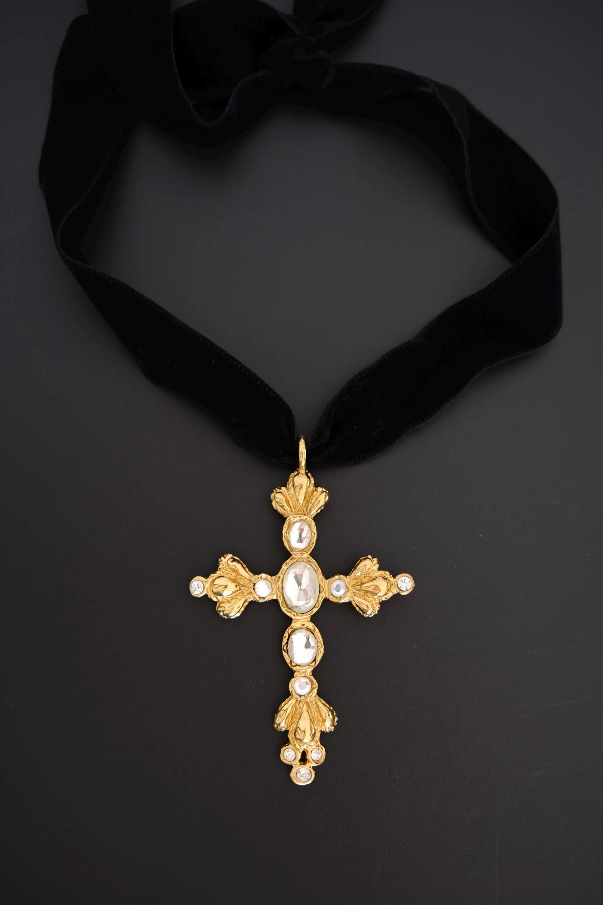 Vintage Christian Lacroix oversized gold-tone cross pendant necklace with clear crystals and black velvet ribbon choker