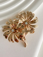 Vintage Christian Dior gold flower brooch elegant rhinestone feminine luxury jewelry