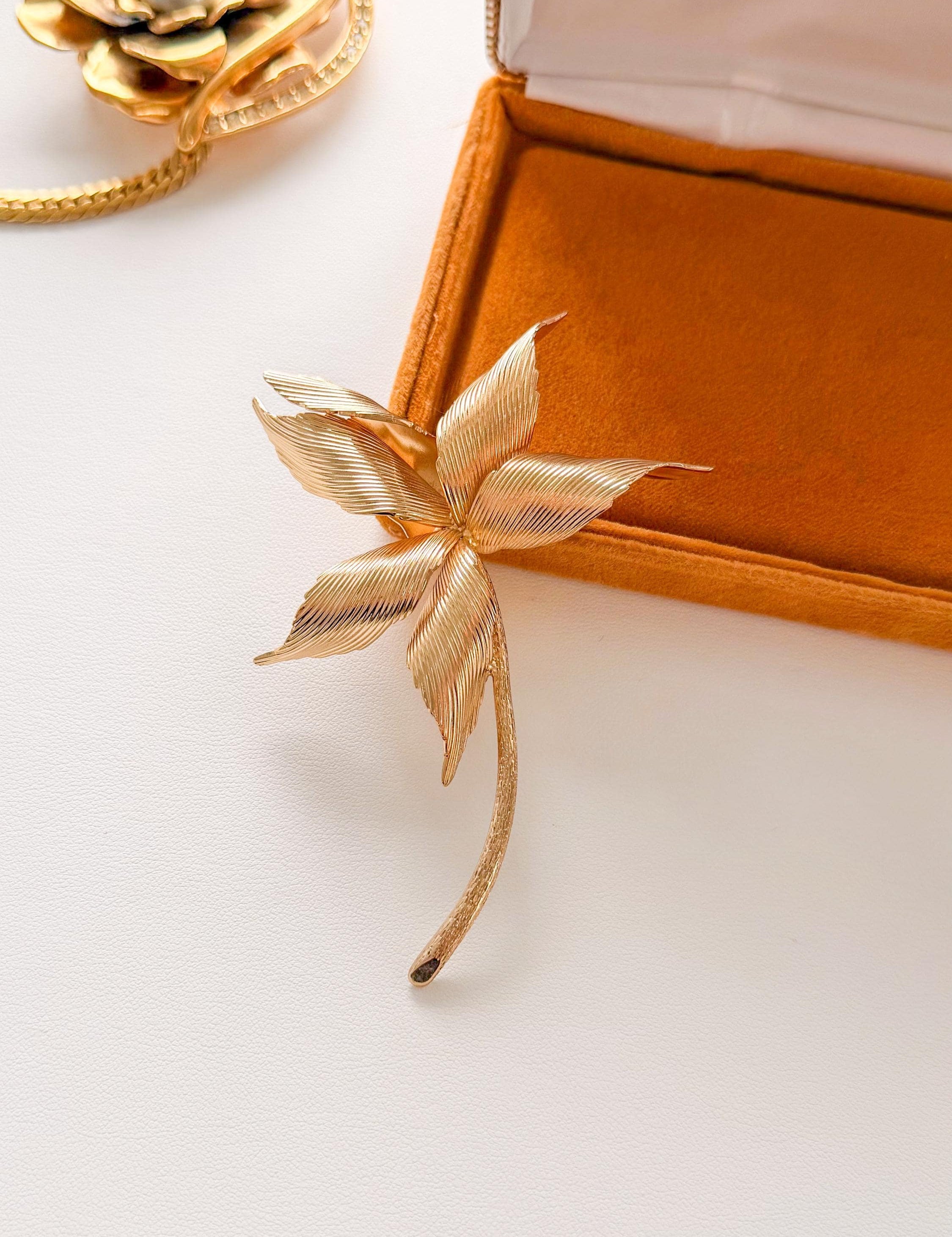 Elegant vintage Dior large gold flower brooch statement timeless luxury jewelry