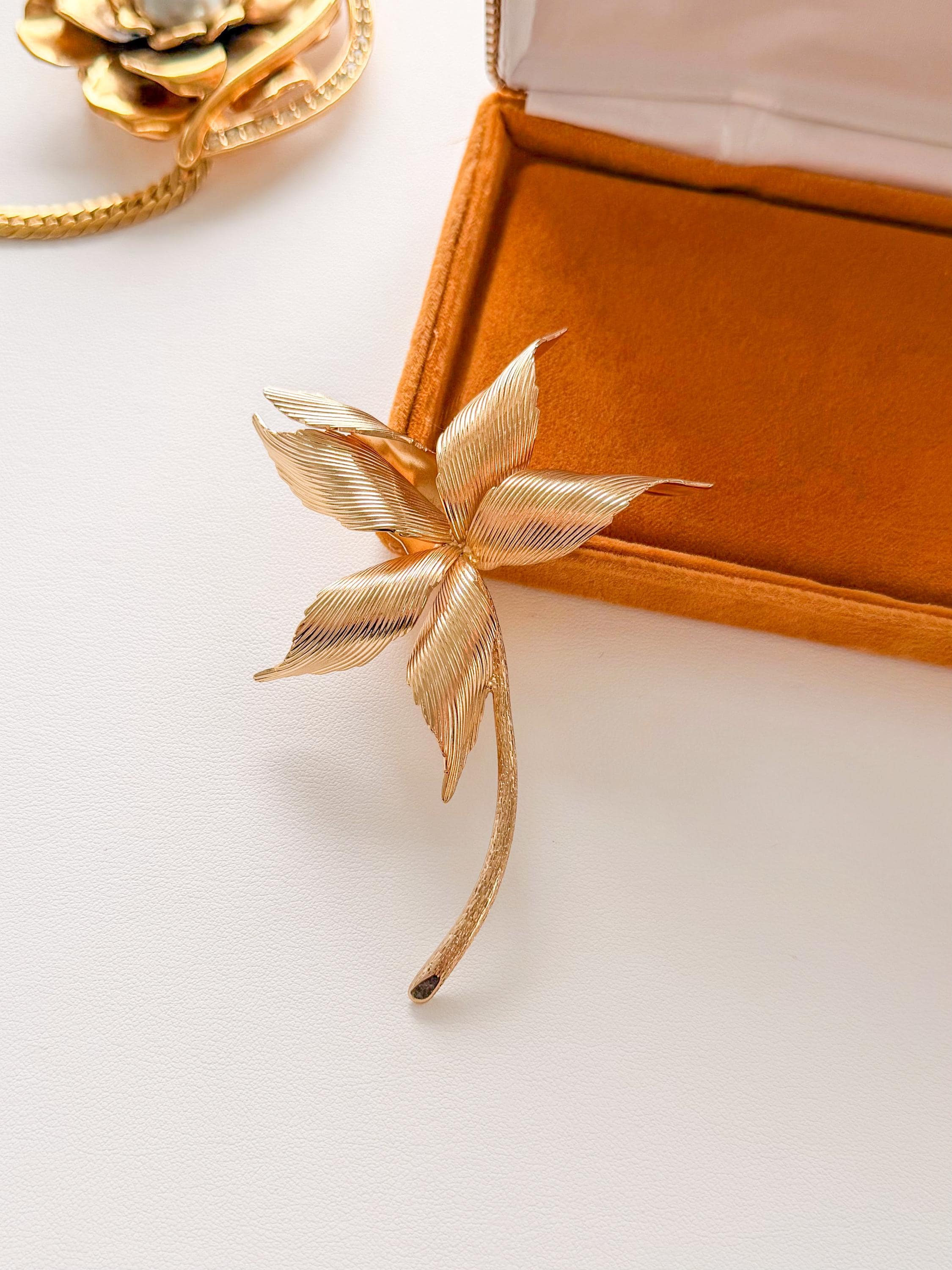 Elegant vintage Dior large gold flower brooch statement timeless luxury jewelry