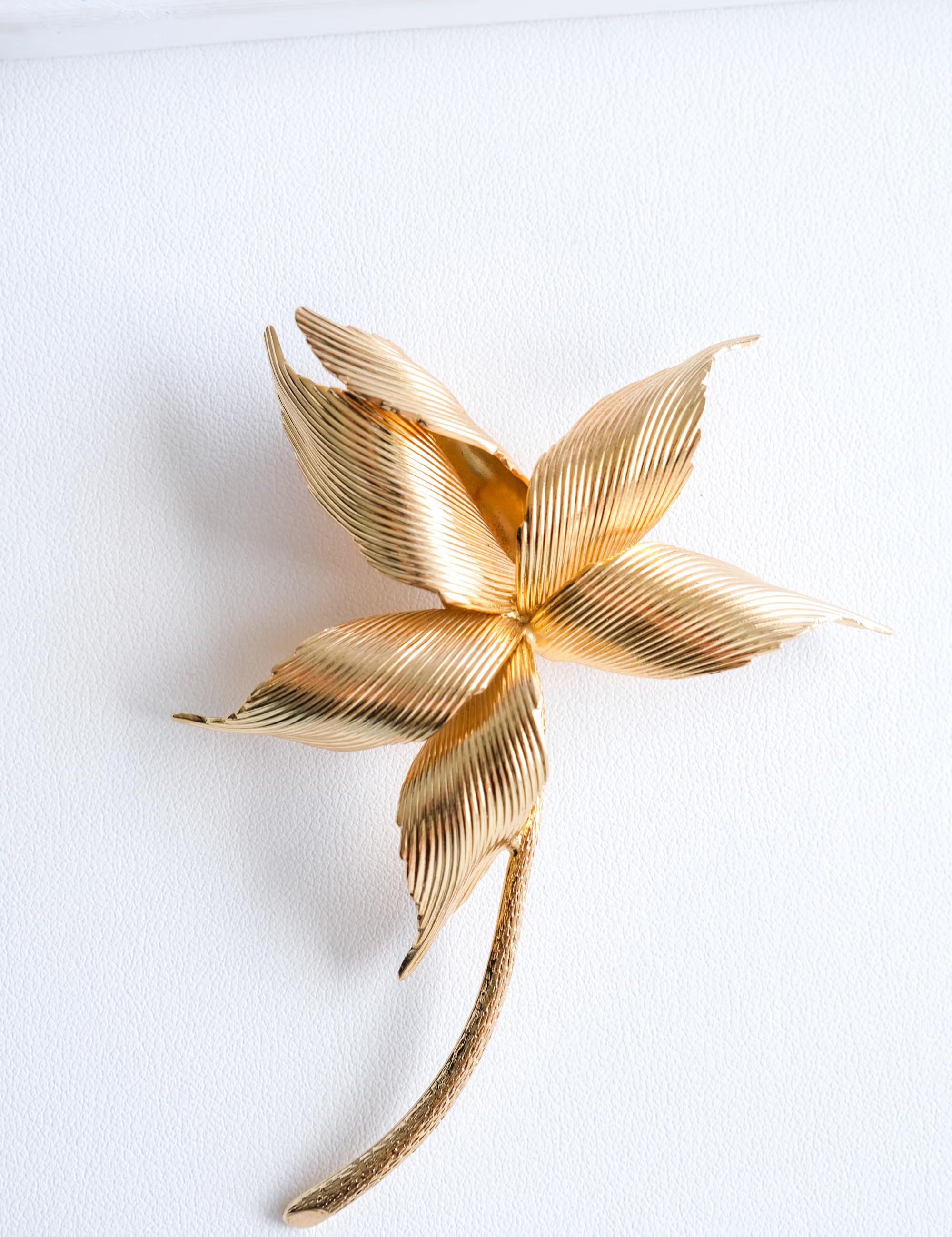 Elegant vintage Dior large gold flower brooch statement timeless luxury jewelry