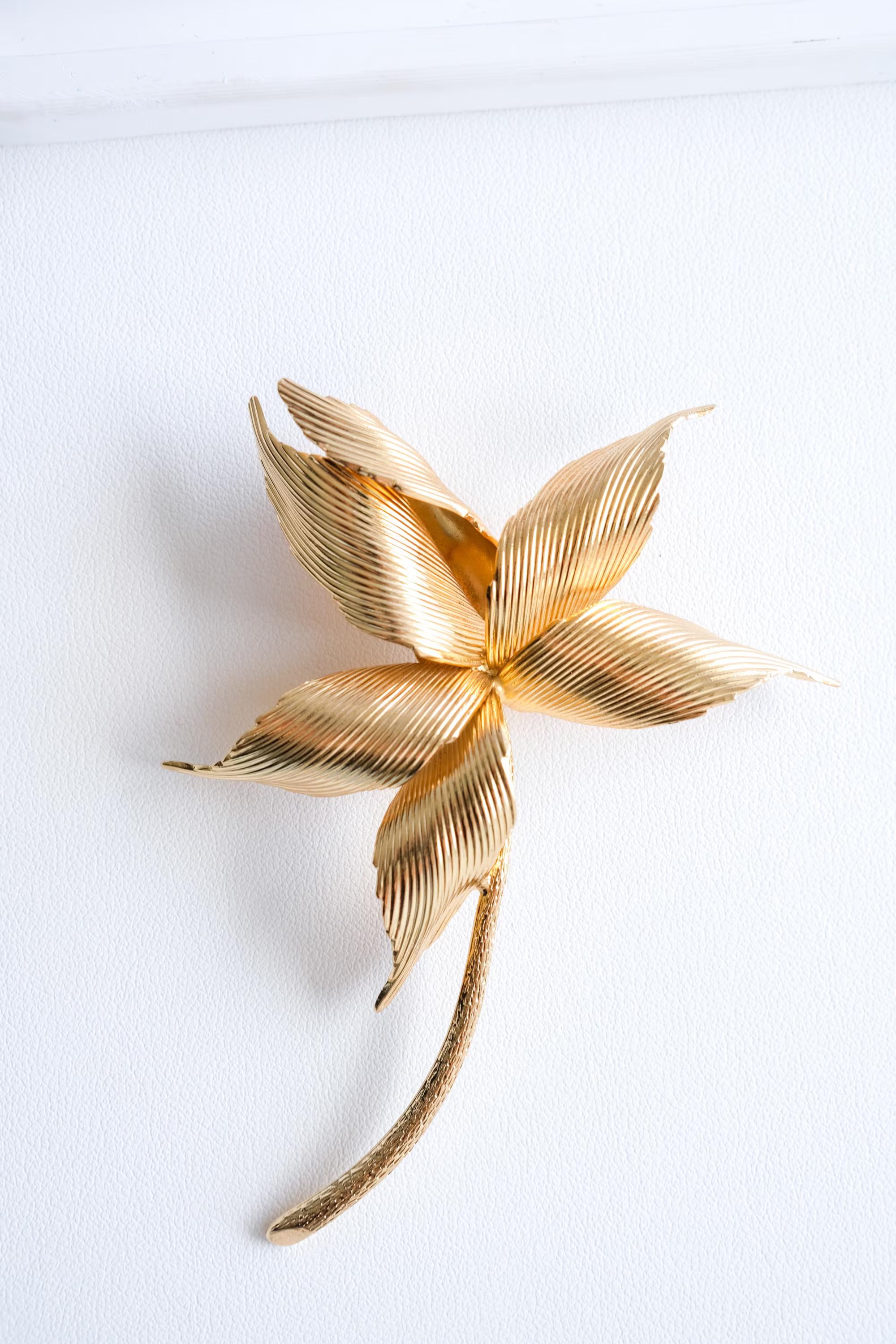 Elegant vintage Dior large gold flower brooch statement timeless luxury jewelry