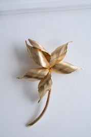 Large Dior gold flower brooch size view statement luxury accessory