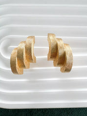 Vintage Dior earrings, Christian Dior jewelry, gold-tone clip-on earrings, designer statement earrings, 1980s Dior jewelry