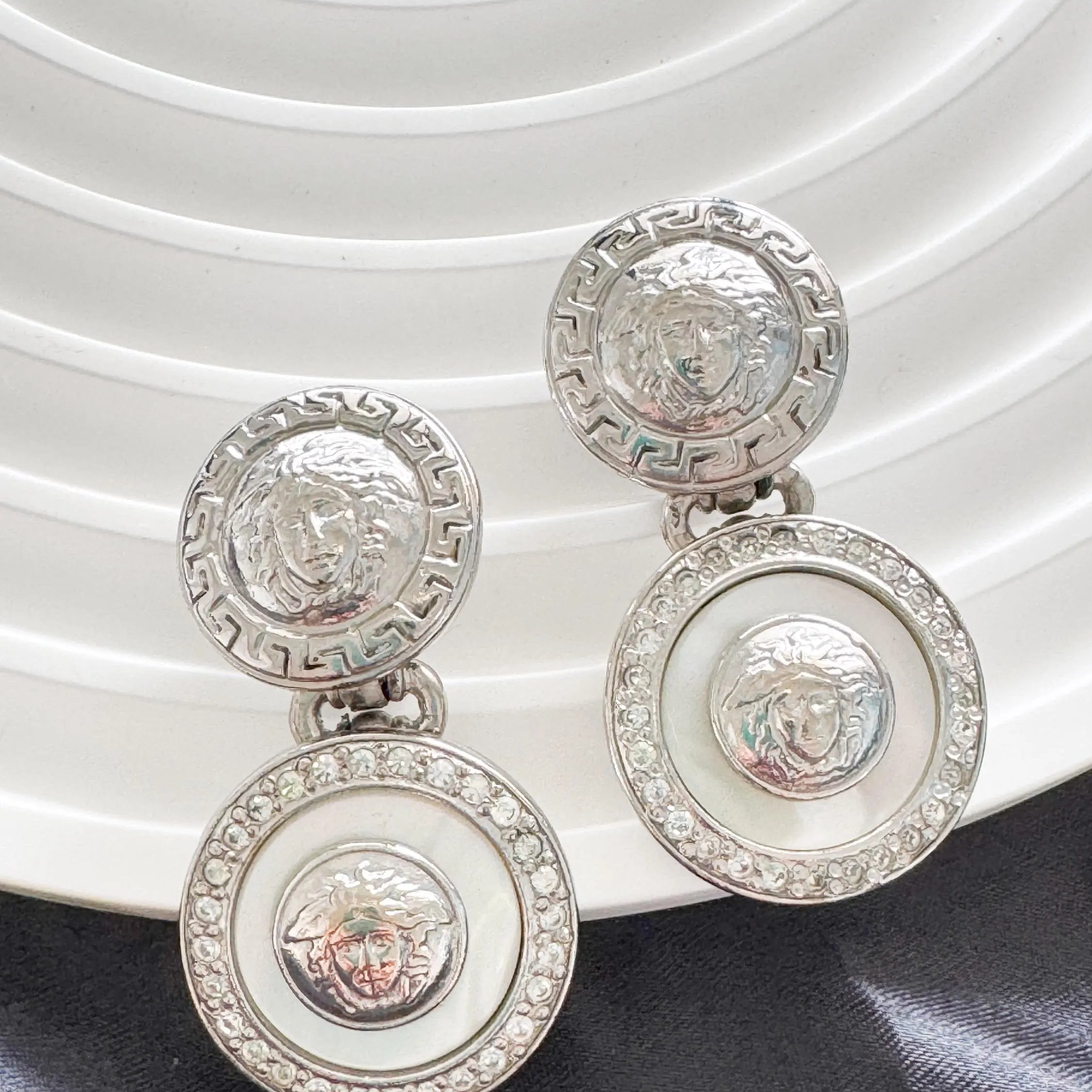 Vintage GIANNI VERSACE Medusa Dangle Earrings: Rhodium Plated Crystal Clip-Ons