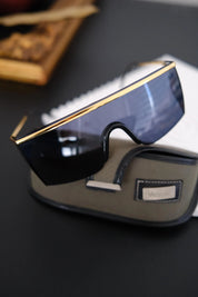 Vintage Gianni Versace MOD 790 panoramic shield sunglasses styled for a bold editorial fashion look