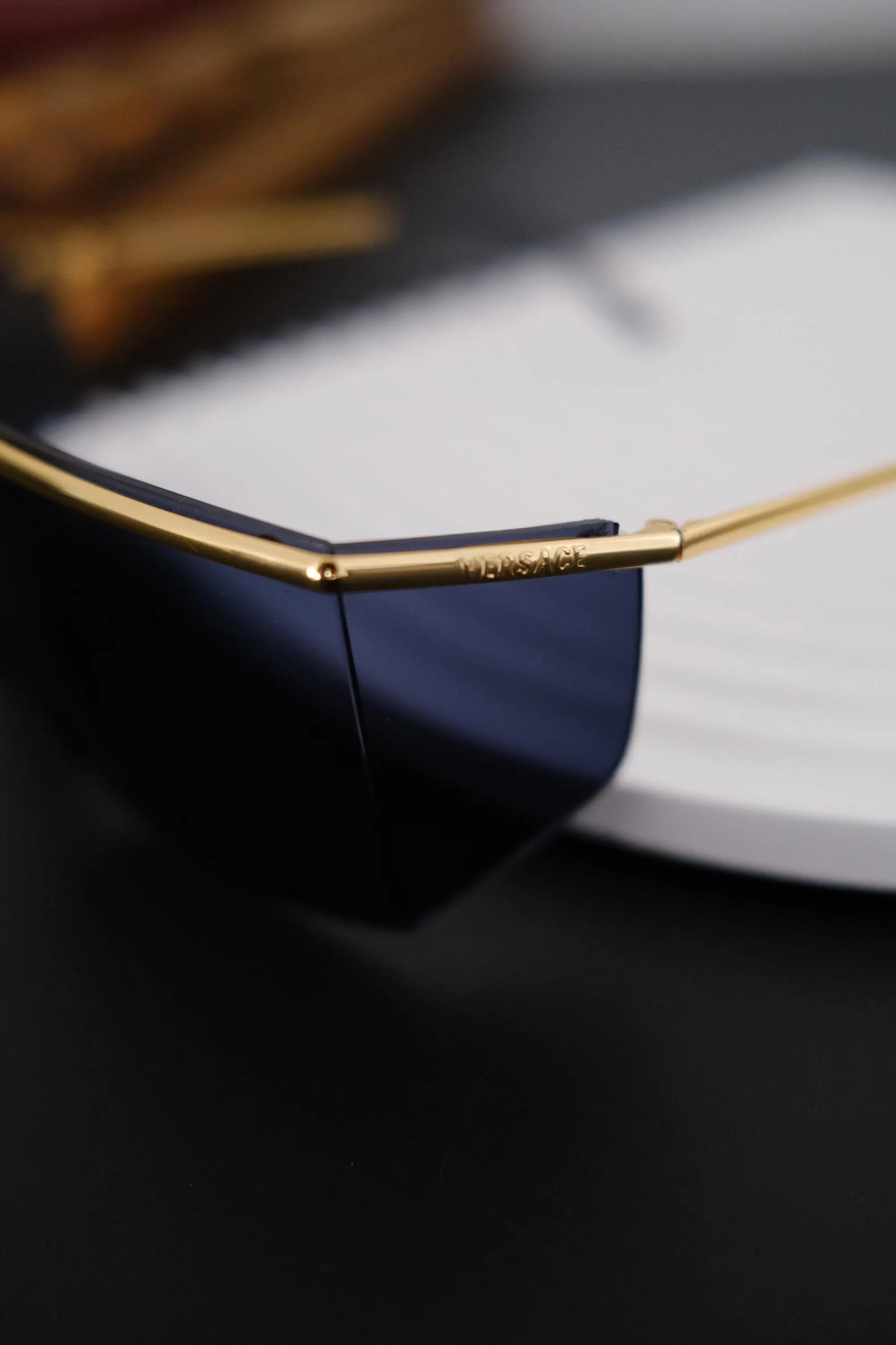 VERSACE signature engraved on the gold tone upper bar of vintage Gianni Versace MOD 790 sunglasses