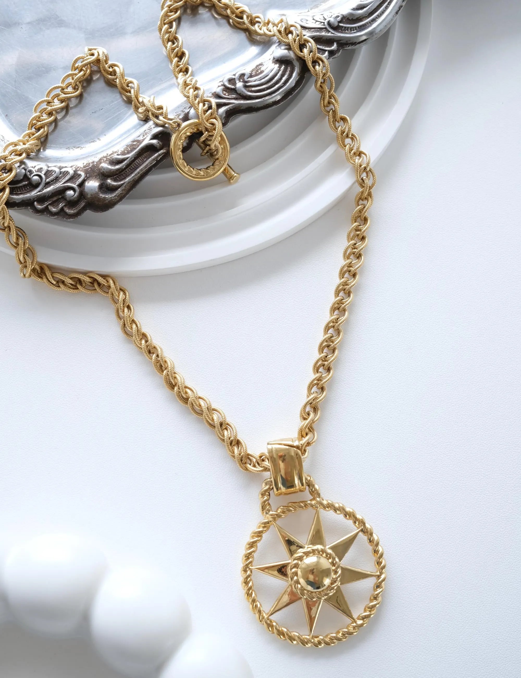 Vintage Givenchy long gold necklace with iconic 4G star pendant and rolo chain