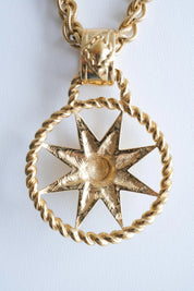 Back view of Givenchy 4G pendant showing vintage epoxy detail and craftsmanship