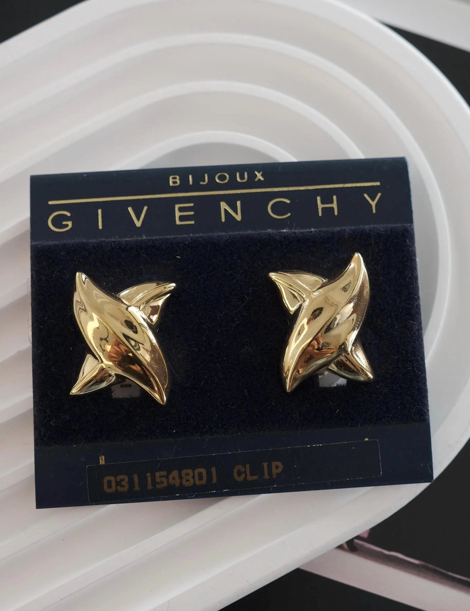 Vintage Givenchy earrings, gold-plated clip-on earrings, 1980s designer jewelry, sculptural statement earrings, Givenchy logo earrings