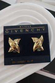Vintage Givenchy earrings, gold-plated clip-on earrings, 1980s designer jewelry, sculptural statement earrings, Givenchy logo earrings