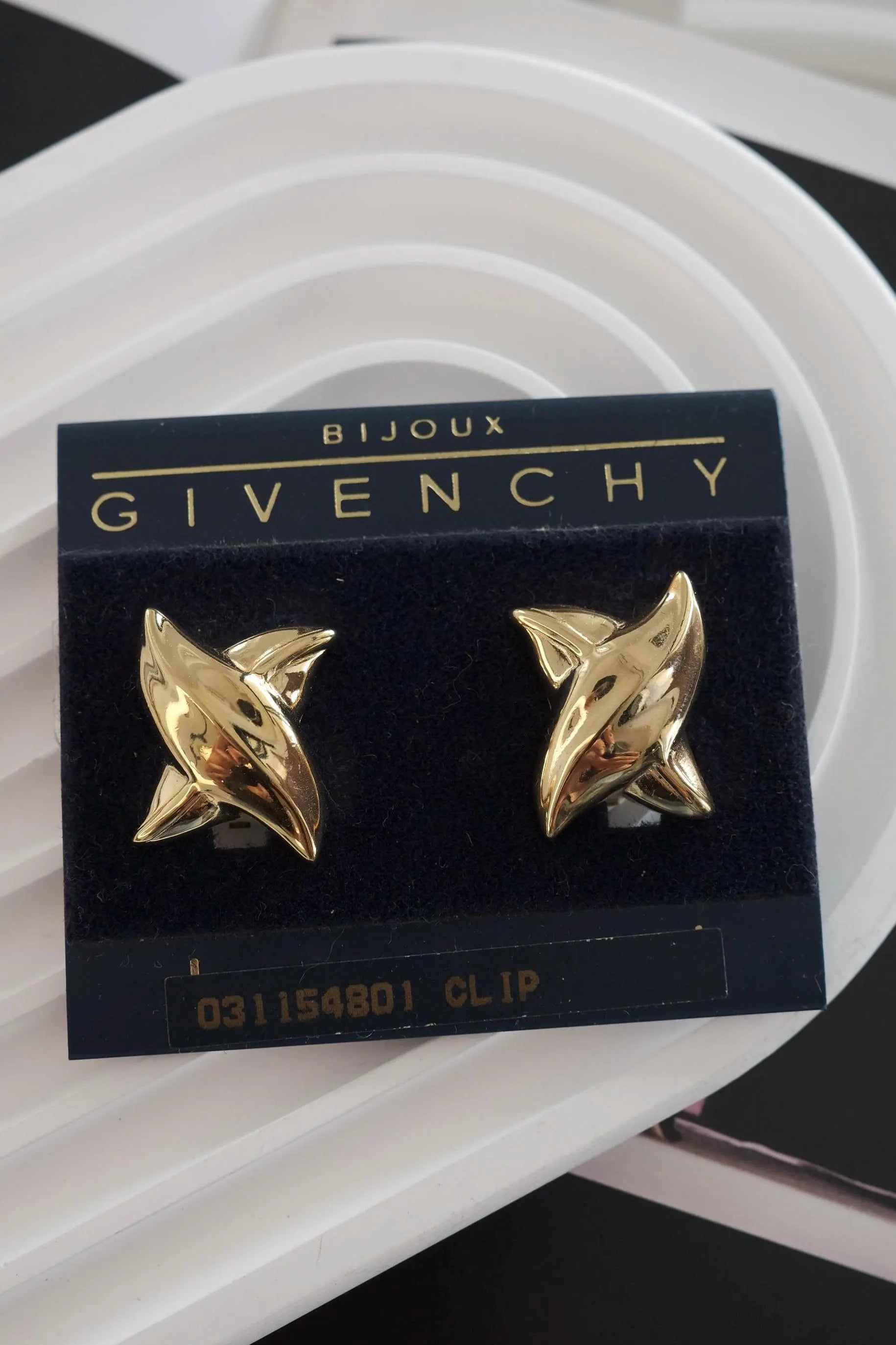 Vintage Givenchy earrings, gold-plated clip-on earrings, 1980s designer jewelry, sculptural statement earrings, Givenchy logo earrings
