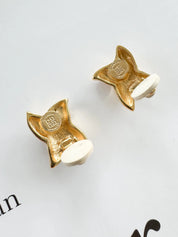 Vintage Givenchy earrings, gold-plated clip-on earrings, 1980s designer jewelry, sculptural statement earrings, Givenchy logo earrings