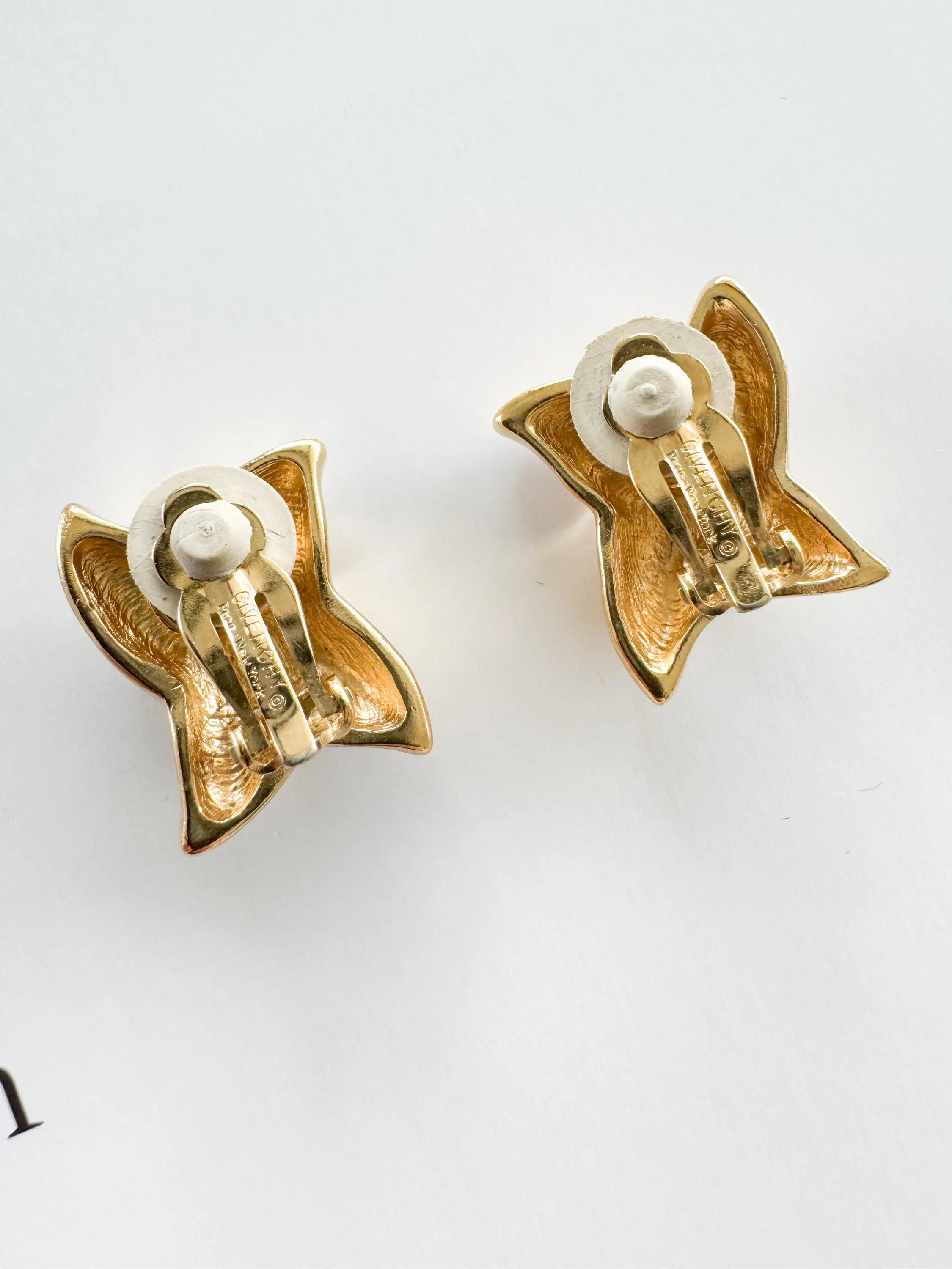 Vintage Givenchy earrings, gold-plated clip-on earrings, 1980s designer jewelry, sculptural statement earrings, Givenchy logo earrings