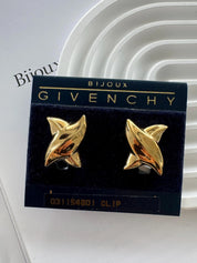 Vintage Givenchy earrings, gold-plated clip-on earrings, 1980s designer jewelry, sculptural statement earrings, Givenchy logo earrings