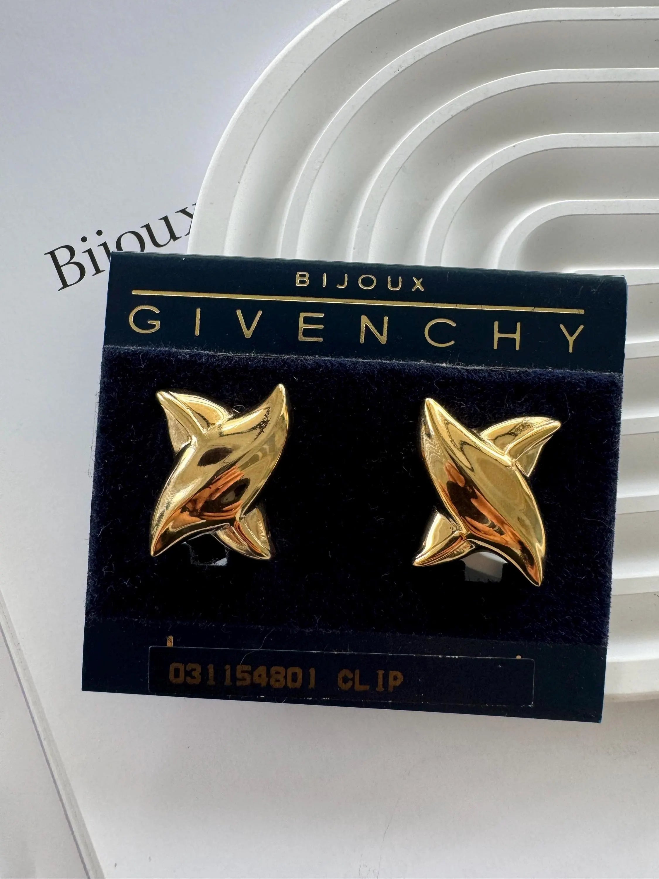 Vintage Givenchy earrings, gold-plated clip-on earrings, 1980s designer jewelry, sculptural statement earrings, Givenchy logo earrings