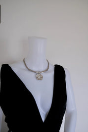 Vintage Givenchy silver-tone choker necklace with crystal flower statement centerpiece