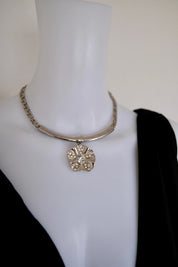 Vintage Givenchy silver-tone choker necklace with crystal flower statement centerpiece